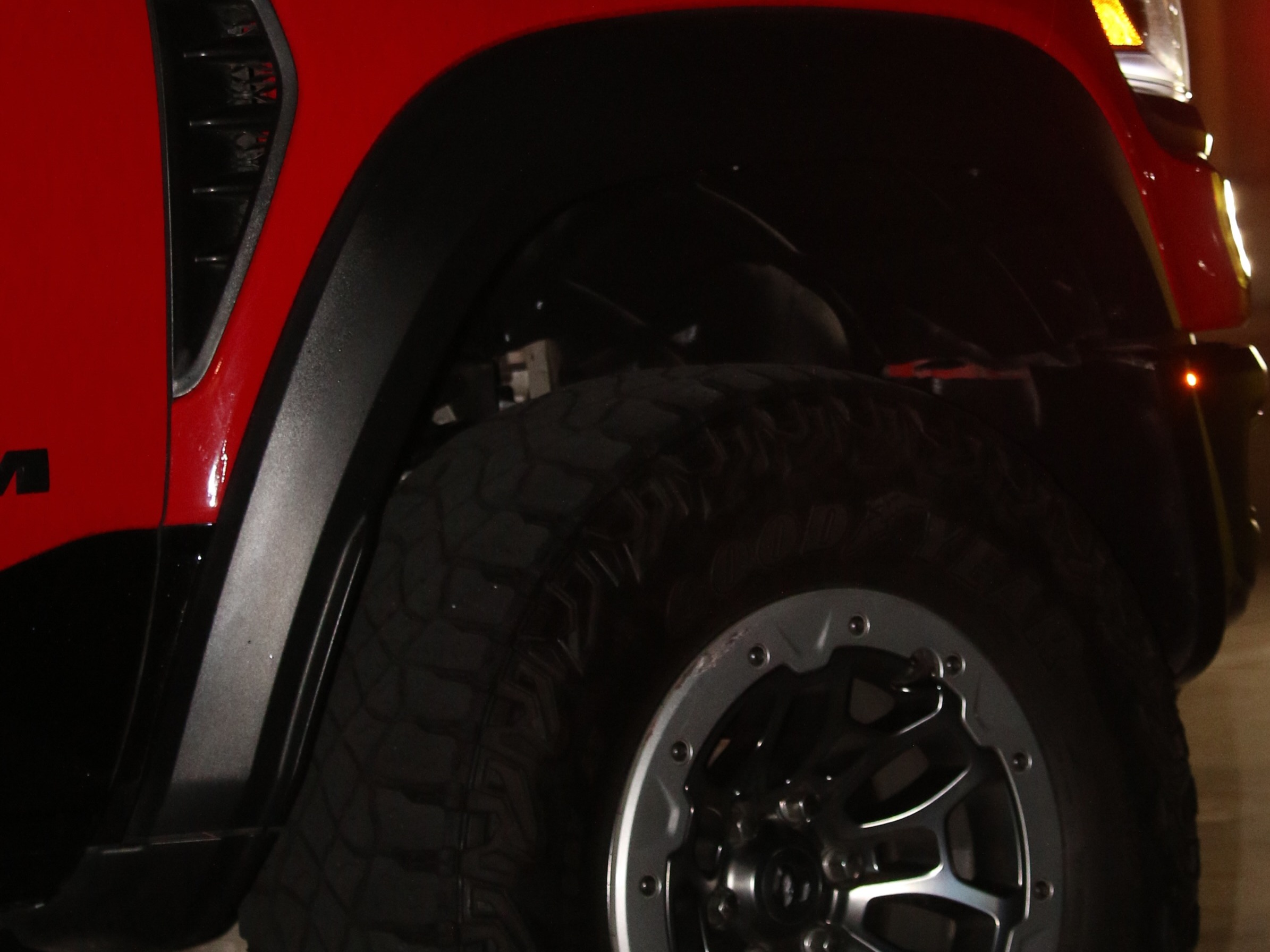 Night detail — two trucks after dark